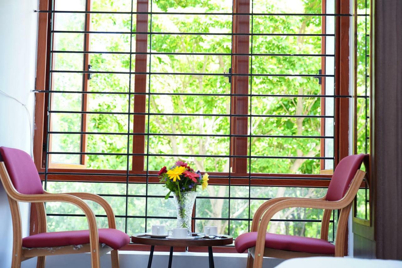 Unnathi Suites Mysore Exterior photo
